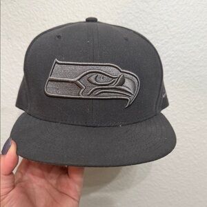 NFL Black Snapback Hat with Embroidered Team Emblem